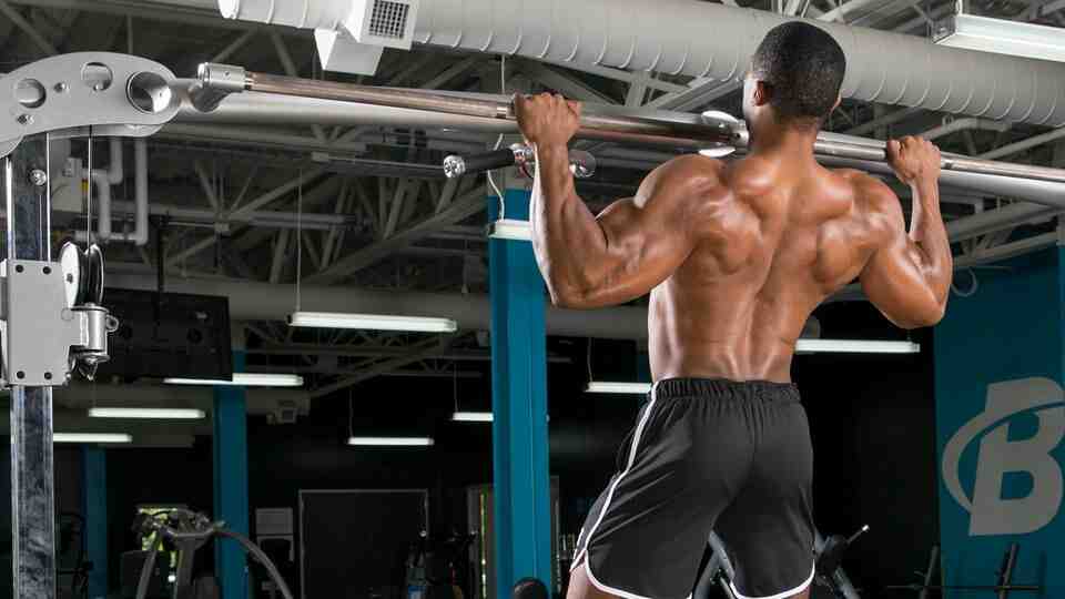 How do bodybuilders build a wide back?
