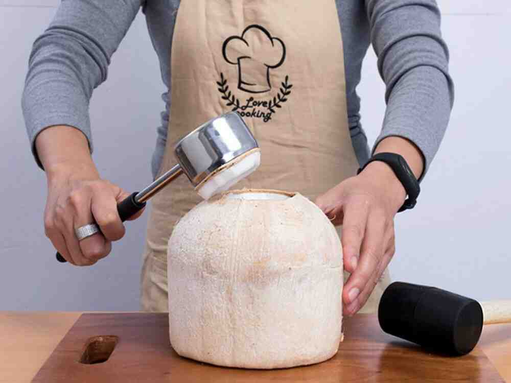 What is the best tool to open a coconut?
